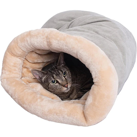 Cat inside a gray plush sleeping bag
