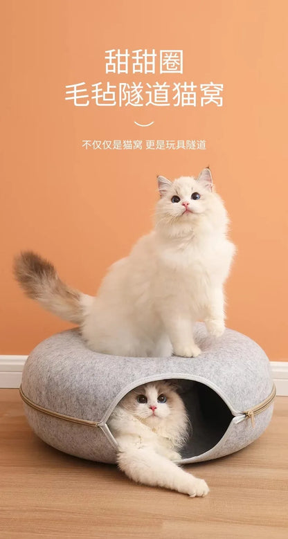Cats using the stacked cave and top lounger